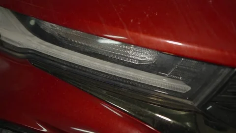 A close-up shot of a modern car LED headlight Stock Footage 340820886