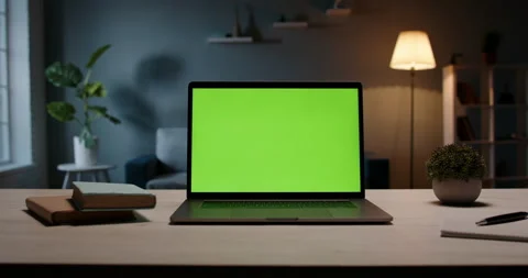 Close up shot of modern chroma key green screen laptop computer set up for work Stock Footage