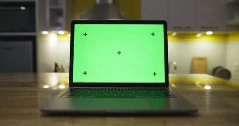 Close up shot of modern kitchen chroma key green screen laptop computer set up Vídeos de archivo 224858484
