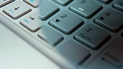 Close-up Shot of a Modern Numeric Keypad on a Metallic Computer Keyboard Video stock 307462634