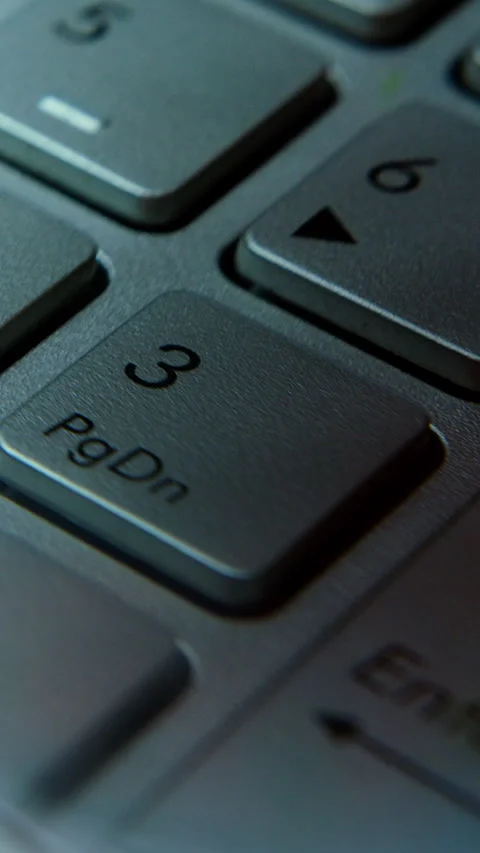 Close-up Shot of a Modern Numeric Keypad on a Metallic Computer Keyboard ,v.. Video stock 307576372