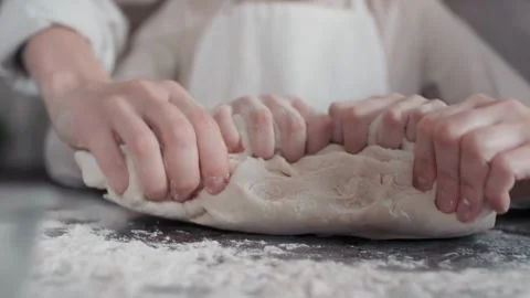 Close up shot of mom teaching his daughter cooking knead flour bread Baker .. Stock Footage 272566174
