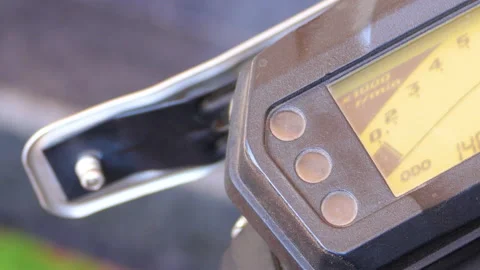 Close shot of a motorcycle speedometer with indicator signal light blinking Stock Footage 145362302
