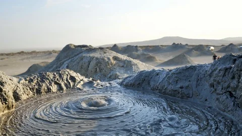 Close up shot of the mud exploding from the earth at the Mud Volcanoes in 库存影片 100349266