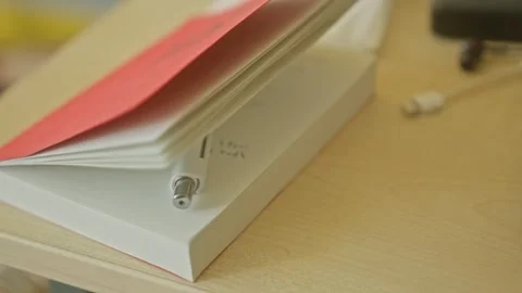 Close up shot of notepad and pen on desk Stock Footage 347168761