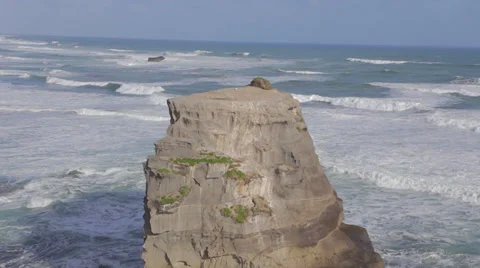 Close shot of ocean rock cliff zoomed to wider shot 動画素材 36578051