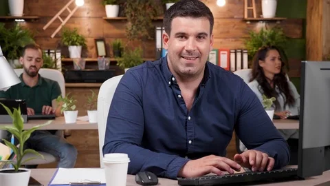 Close up shot of office worker smiling to the camera Stock Footage 112651323