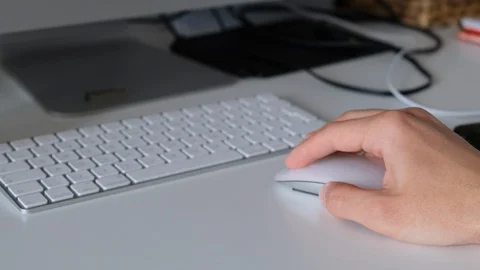 Close up shot of an office worker working with a wireless mouse and keyboard Stock-Footage 130006114