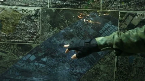 Close up shot of an officer's hand pointing to certain things on a map Stock Footage