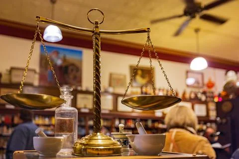 Close up shot of an old scale in the old Oklahoma Frontier Drug Store Museum Stock Photos