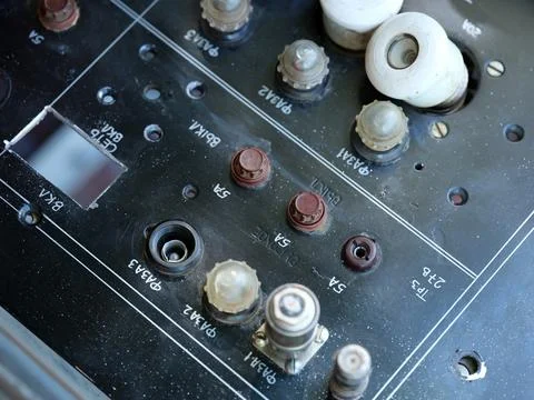 A close-up shot of an old Soviet-era electrical control panel with Russian cy Foto stock