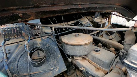 Close up shot of old truck engine abandoned in the desert Video stock 196739445
