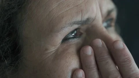 Close up shot of old woman's crying eyes. Elderly senior woman is unhappy. Stock Footage 133144251