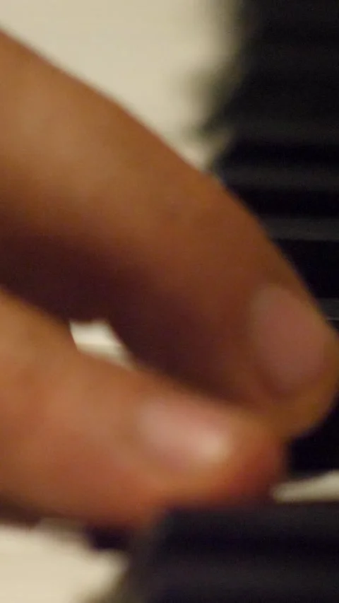 Close shot of one hand playing electronic keyboard Video stock 230665261