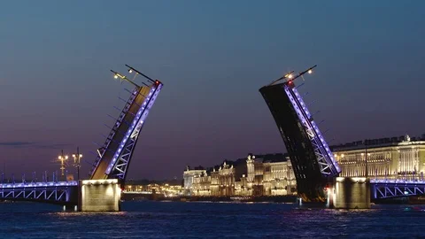 Close shot of opened Palace Bridge and illuminated buildings in the night Stock Footage 85007475