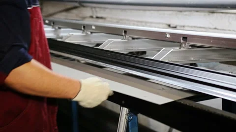 Close up shot operator bending metal sheet by sheet bending machine Stock Footage 67094155