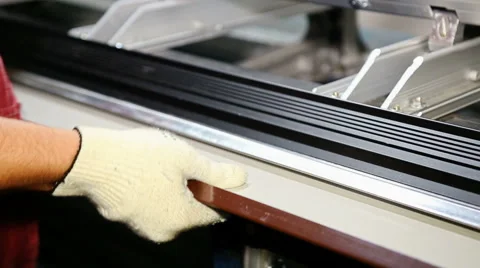 Close up shot operator bending metal sheet by sheet bending machine Stock Footage 67094160