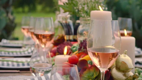 Close up shot of an outdoor dining table setup up with holiday decorations at Video stock 140554129