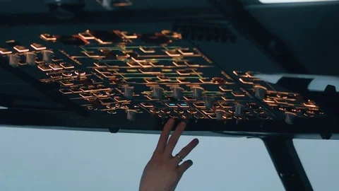 Close shot of overhead panel of modern aircraft. Aircraft commander switch switc Stock Footage 71824469
