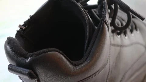 Close-up shot of a pair of high-quality black leather shoes Stock Footage 322535329