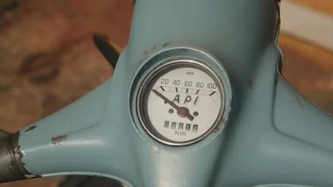 A close up shot panning across the handlebars of a blue classic vintage Stock Footage 232104329
