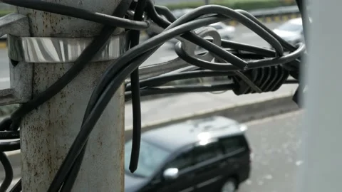 Close up shot of part electricity pole, among them are cables and conductor. Stock Footage 237797237