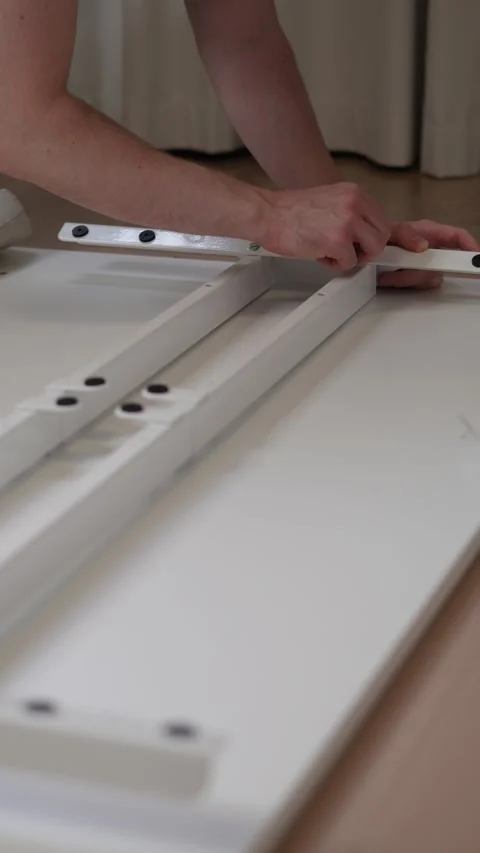 Close-up shot of a person’s hands assembling furniture Stock Footage 293102840
