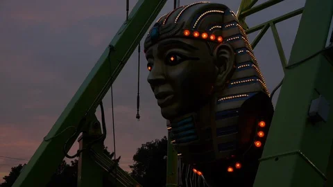 Close Up Shot of Pharaoh Head on Retro Amusement Park Ride Stock Footage 92755072