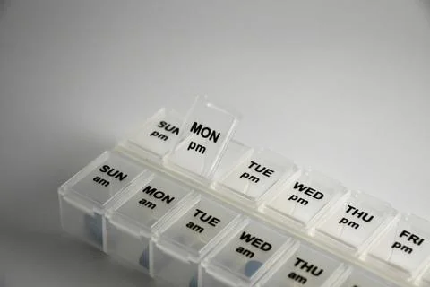 Close up shot of a pill box Stock Photos