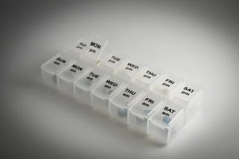 Close up shot of a pill box Stock Photos