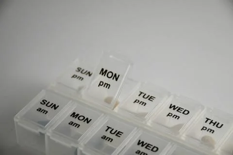 Close up shot of a pill box Stock Photos