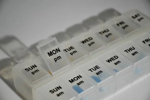 Close up shot of a pill box Stock Photos