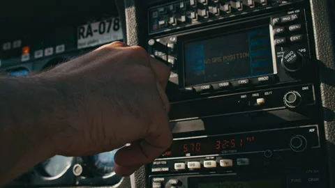Close-up shot of pilot hand on a dashboard in cabin of small single engine Stock Footage 203826173