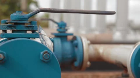 Close Up Shot of Pipes and Valves at an oil and gas Well Stock Footage 45236712