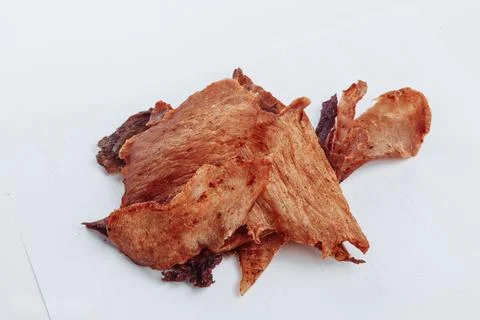 A close-up shot of a pitmaster cleanly slicing through the tender cut Stock Photos