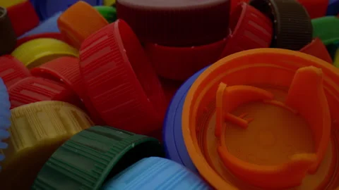 Close-up shot of plastic caps. Multicolored plastic caps background. Slider 動画素材 203919655
