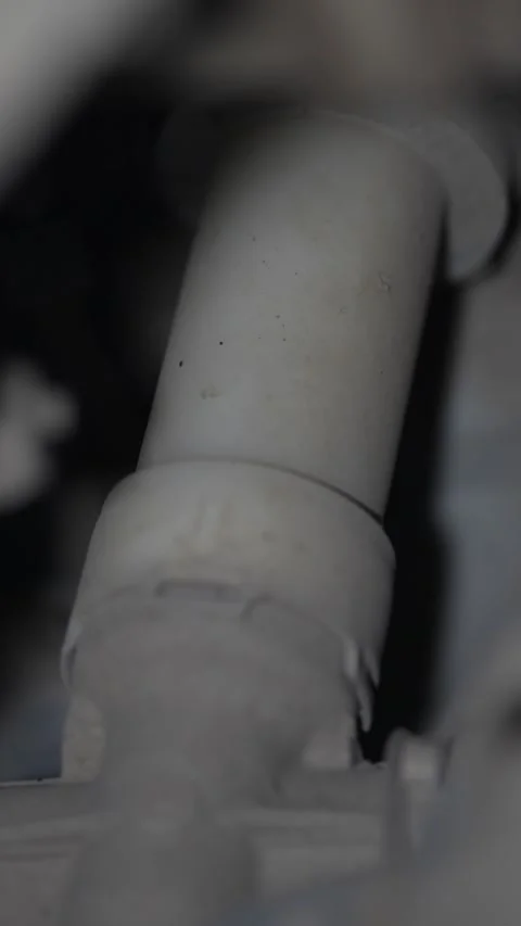 Close up shot of plastic car radiator hose quick connector. Stock Footage 343756192