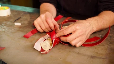Close up shot of the plexus of leather ropes and the creation of a boot Stock Footage 83141915