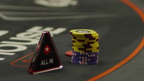 A close-up shot of poker chips next to all-in marker Stock Footage 336238511