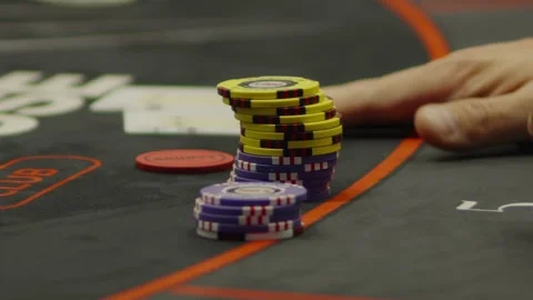 A close-up shot of poker chips next to all-in marker Stock Footage 336238533