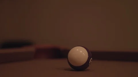 Close up shot of a pool table, hitting the 12 ball into the socket in 4k. Stock Footage 88285634