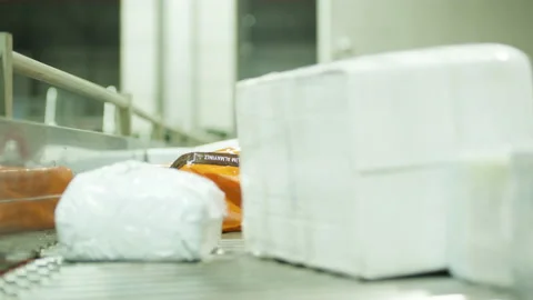 Close Shot of Postal Packages moving on belt at Postal Transfer Facility Stock Footage 195234937