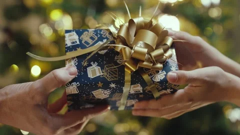Close-up Shot of Presenting a Gift Stock Footage 254558884