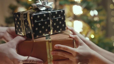 Close-up Shot of Presenting a Gift Stock Footage 255362737