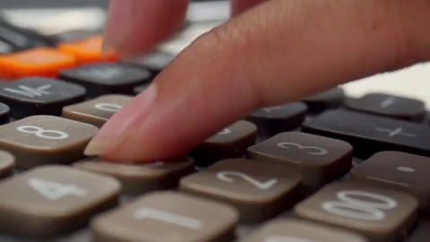 Close up shot of pressing calculator button 库存影片 276586435
