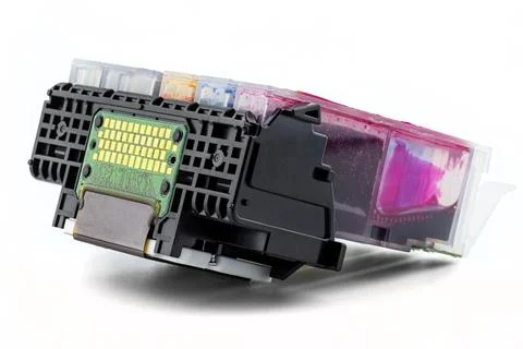 A close-up shot of a printer head and ink cartridges inserted into it, isolat Foto stock