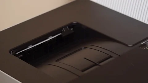 Close up shot of the printer that prints the result of the retinal tomogram Stock Footage 89392192