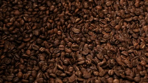 Close-up shot of the process of roasting coffee beans. Coffee Roasting Process. Stock Footage 115849789