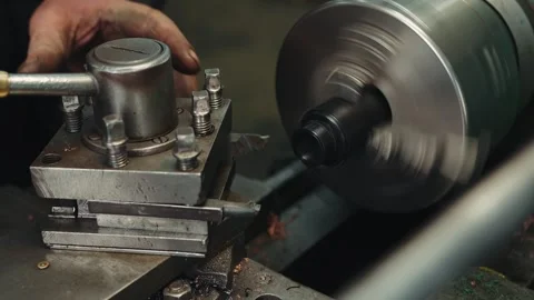 Close-up shot of  processing and turning of a plastic workpiece on a lathe Stock Footage 285641022