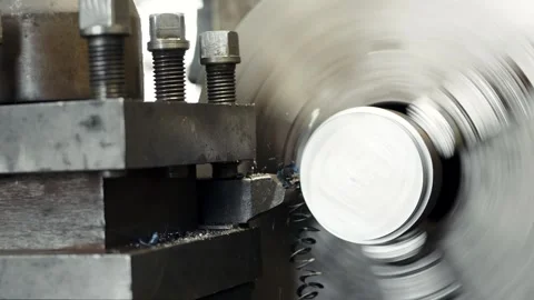 Close-up shot processing of the metal part on the lathe, the lathe processes the Stock Footage 285643216
